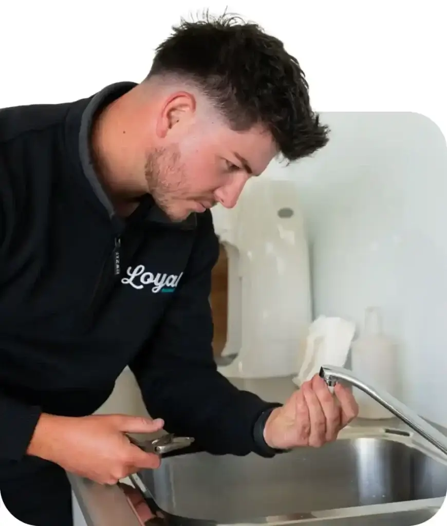 Loyal Plumber repairing taps in Adelaide.
